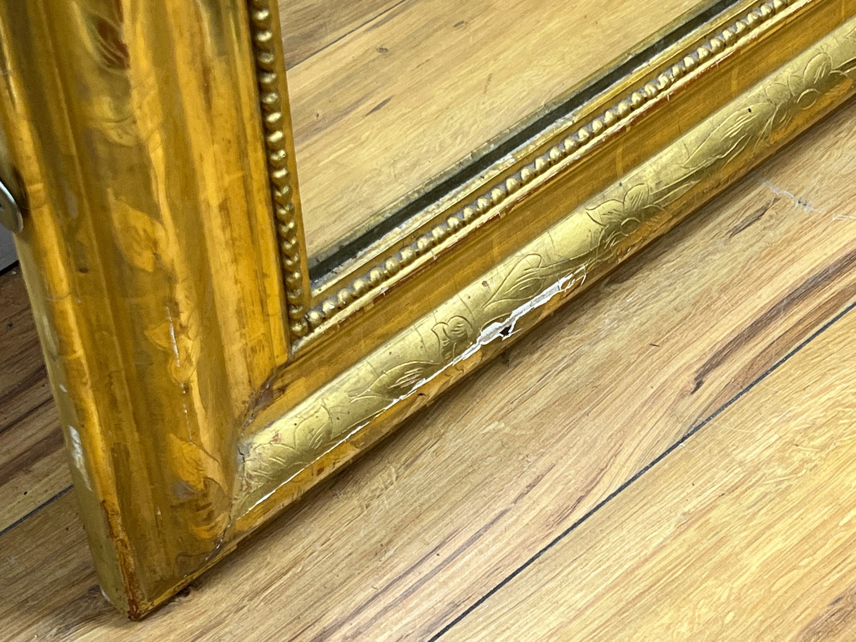 A 19th century French giltwood overmantel mirror, width 100cm, height 141cm